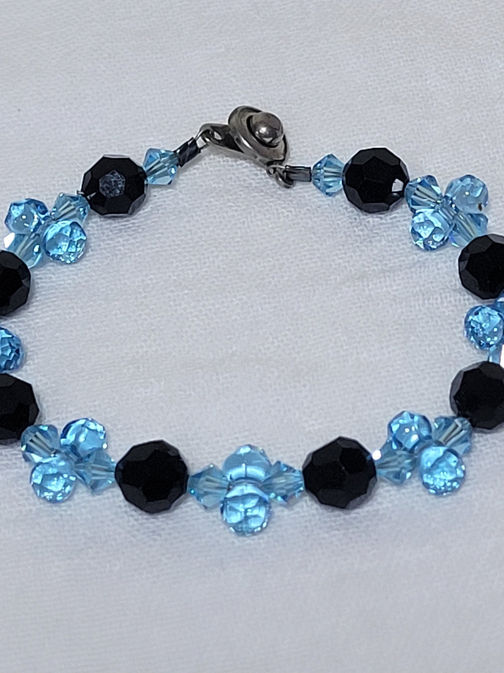 Coach Black and Light Blue Crystal Beaded Bracelet